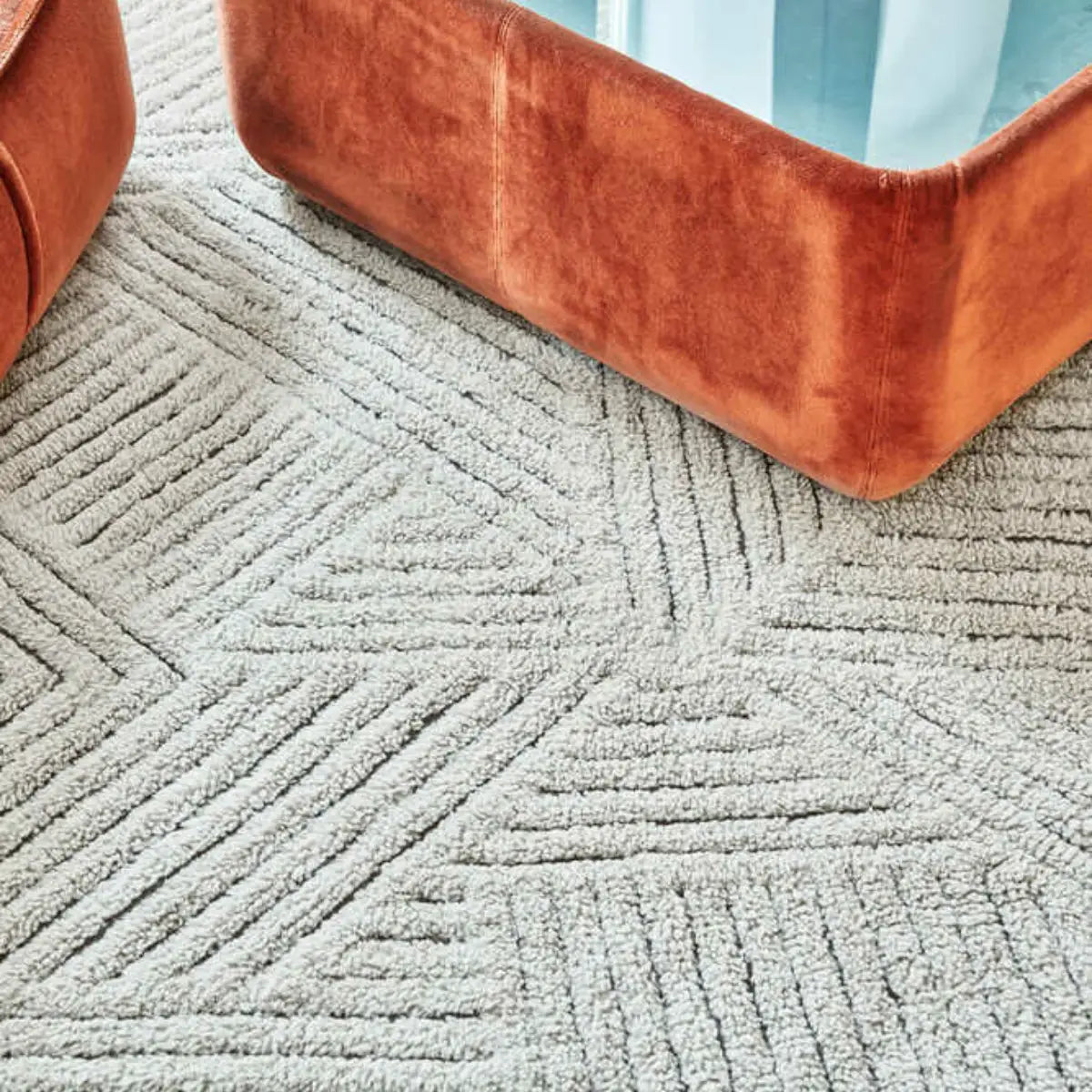 Isabelline-Geometric-Rug-Under-Ottoman