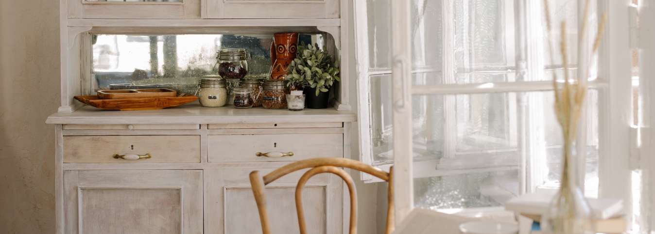 farmhouse kitchen with armoire