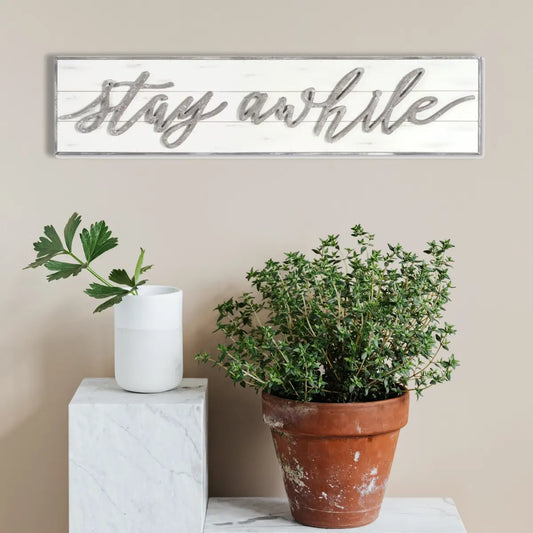 stay-awhile-wall-sign-on-wall
