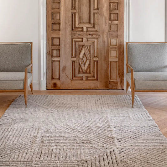 taupe geometric rug on floor