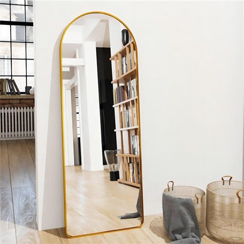 Golden Arched Full Length Mirror against wall